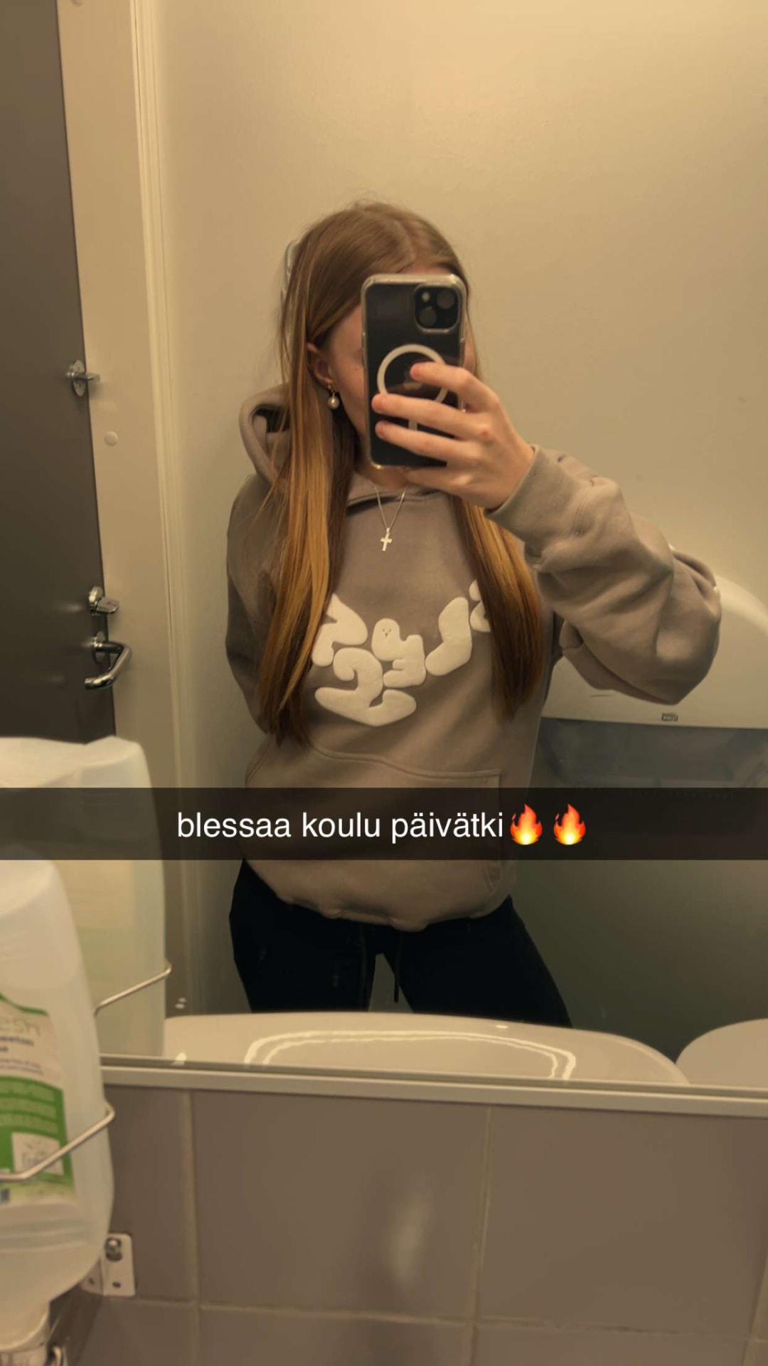 Mirror selfie in a Blessed hoodie